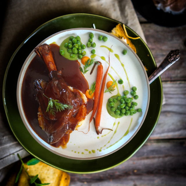 full of World flavours .slow cooked lamb shank in velvety red wine and herb sauce sauce.